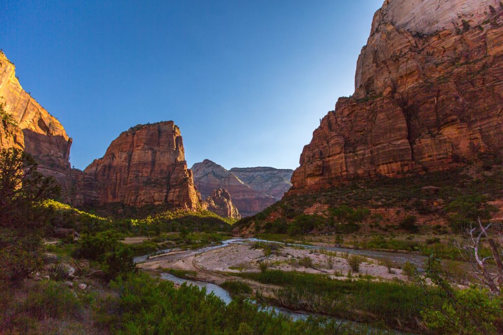 West of the USA - 
Located in southwestern Utah on the very edge of the Colorado Plateau, Zion National Park owes its beauty to the unique clash of the lush, green high country and the dry desert below.