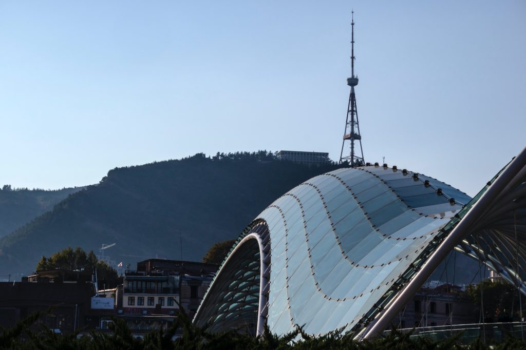 Here you see the Peace Bridge in front of the TV tower on the Mtatsinda Mountain.