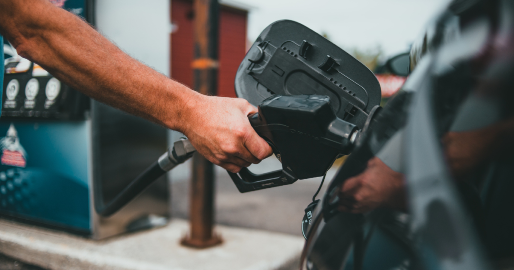 filling up at a gas station