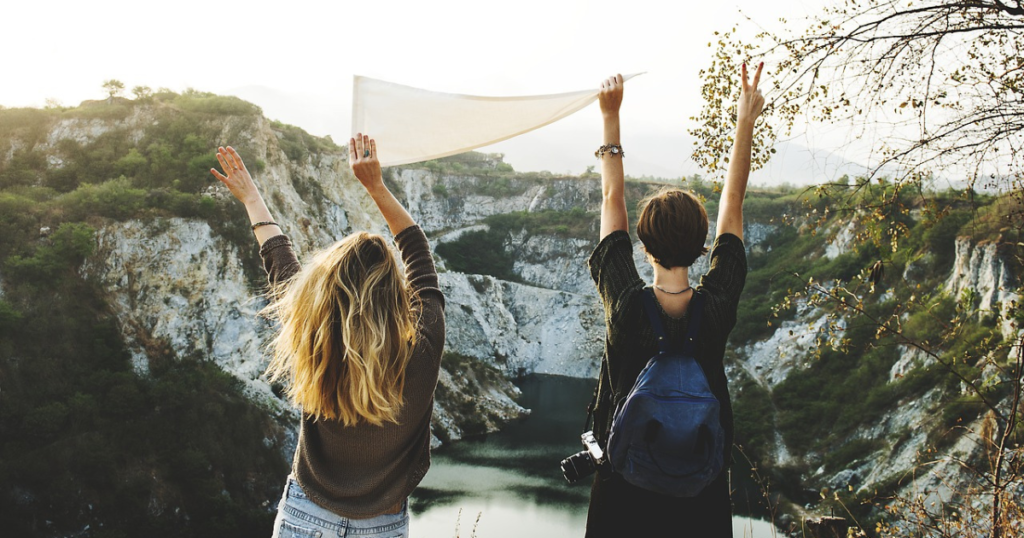 two girls enjoying a nice view