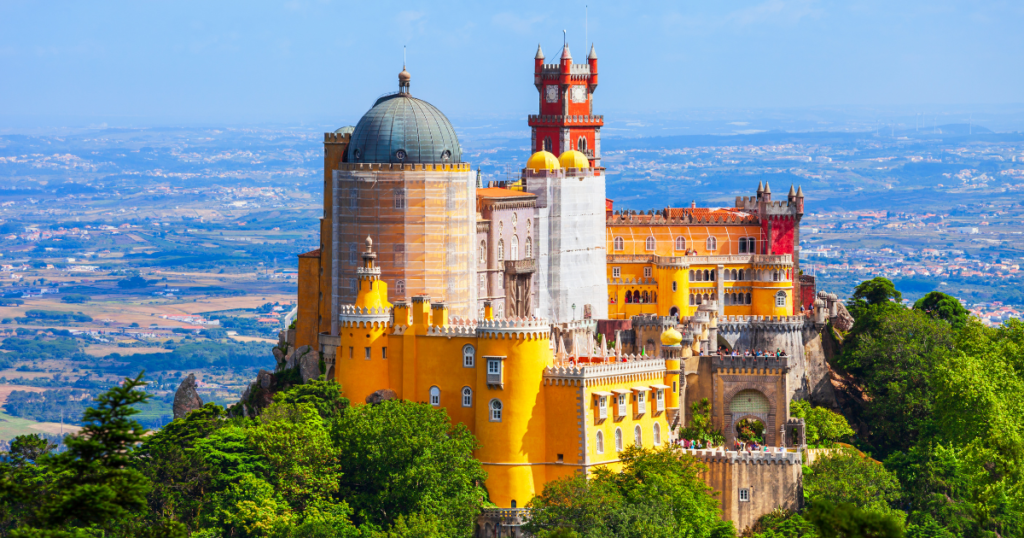 A Fairytale Escape: Experience the enchanting charm of Sintra, just a short day trip from Lisbon. Wander through the dreamlike gardens of Quinta da Regaleira and explore the colorful Pena Palace, a UNESCO World Heritage site. As a digital nomad in Lisbon, this magical escape is right at your doorstep ??