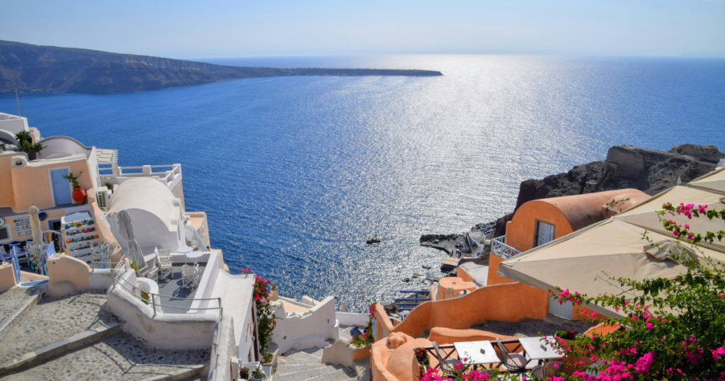 View from Santorini over the blue sea and blue sky