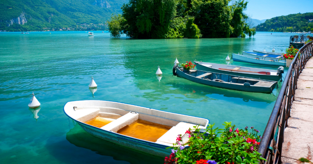 Active Holiday Ideas in the French Alps: Try your hand at stand-up paddleboarding or kayaking on Lake Annecy