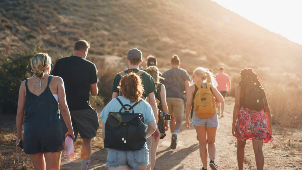 walking group of travelers 